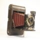 Kodak balgcamera met Anastigmat Symetrique. Verax lens.