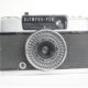 Olympus-Pen EE-2. 35mm camera. zwart. 1968-1977. Japan. Olympus-Pen EE-2. 35mm camera. zwart. 1968-1977. Japan.