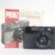 Prinz Saturn 35 auto. (Halina 35-600). Viewfinder camera. 35mm film. 1974. Engeland Prinz Saturn 35 auto. (Halina 35-600). Viewfinder camera. 35mm film. 1974. Engeland