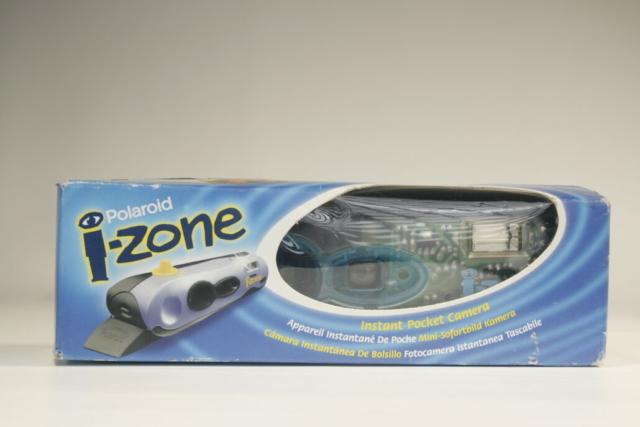 Polaroid i-zone. Transparant model. 35mm film. Compact camera. 1998-2001. USA Polaroid i-zone. Transparant model. 35mm film. Compact camera. 1998-2001. USA